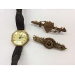 Vintage 9ct gold cased ladies Avia wristwatch and two Victorian 9ct gold bar brooches