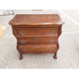 Two Dutch oak bedside chests of three drawers
