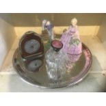 Silver plated circular tray, novelty barometer, two Doulton figures