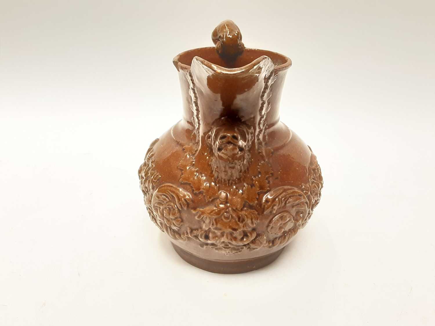 Castle Hedingham Edward Bingham brown glazed pottery jug, with lion on handle and mask decoration, 2 - Image 2 of 6