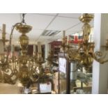 Two large contemporary brass chandeliers