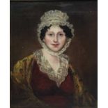 Victorian School, oil on canvas laid down onto board,, half length portrait of a lady in lace bonnet