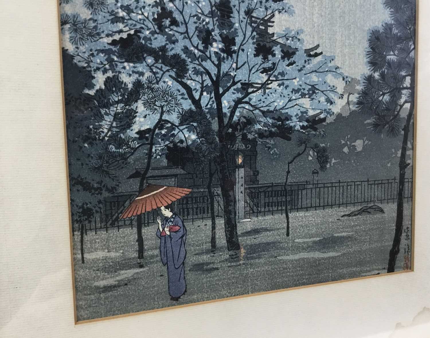 Japanese woodblock print in frame, depicting a female figure holding a parasol with a pagoda in the - Image 2 of 4