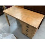 Pine kneehole desk with three drawers