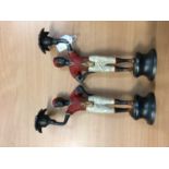 Pair of antique-style painted metal candlesticks in the form of blackamoors