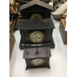 Two black slate mantel clocks and one other mantel clock (3)