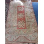 Rug with geometric decoration beige and peach ground, 217cm x 121cm