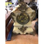 Ornate onyx and gilt metal mantel clock