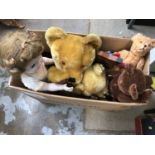 Box of teddy bears and dolls, a boxed Hartley bear, a boxed Joey the Clown nursery tea set, and a sn