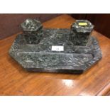Early 20th century green marble desk stand with twin brass mounted hexagonal inkwells