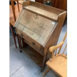 Oak escritoire, mahogany coffee table, folding stool and a mahogany framed cheval mirror (4)