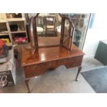 1930s walnut kneehole dressing table with four drawers on cabriole legs and a similar triptych dress