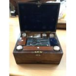 Victorian rosewood writing and sewing box with fitted interior and various accessories