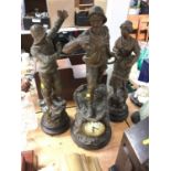 Large early 20th century spelter clock and garniture