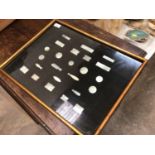 Framed collection of Chinese mother of pearl counters
