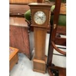 Grandmother clock in oak case with chiming movement