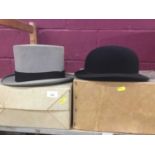 Vintage bowler hat and a top hat in original card boxes