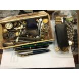 Box of sundries to include an antique brass engraved dial, possibly part of a sun dial, pens, jewell