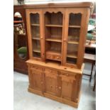 Pine two height kitchen dresser, pine square kitchen table with two drawers and two kitchen chairs (