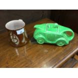 Alan Caiger-Smith glazed mug together with a Sadler green glazed car shaped teapot