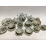 A Japanese eggshell porcelain part tea and coffee service