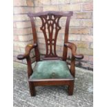 19th century and later mahogany child's chair, the shaped pierced splat above scroll arms and drop-i