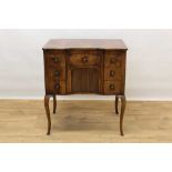 19th century French yewwood chest with writing slide, tambour shutter and seven drawers on cabriole