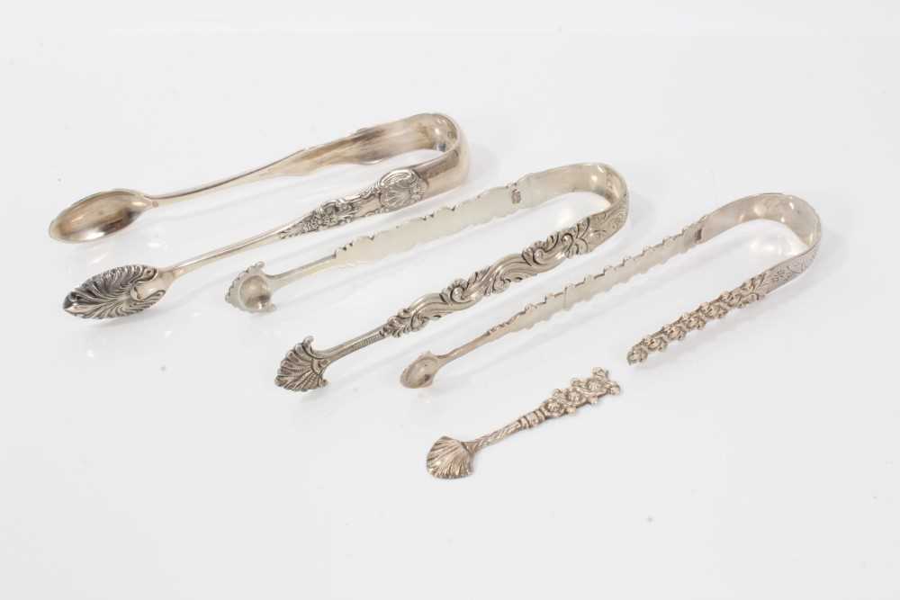 Pair of George III silver sugar tongs with cast and engraved decoration, London circa. 1770, 13.5cm