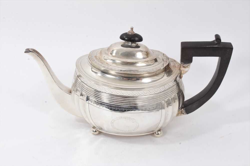 George III silver teapot, bright cut decoration