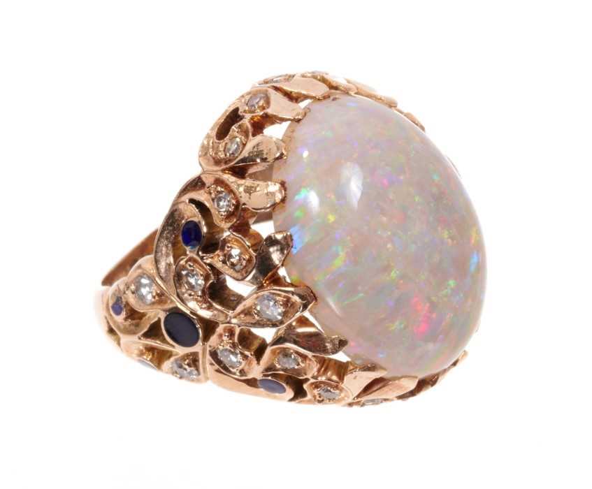 Opal, diamond and enamel cocktail ring with a large oval cabochon opal measuring approximately 19mm