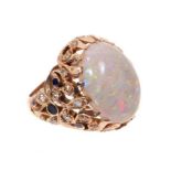 Opal, diamond and enamel cocktail ring with a large oval cabochon opal measuring approximately 19mm