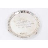 Contemporary silver waiter of circular form, with pie crust border and engraved inscription..