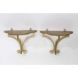Pair of painted wooden Colefax and Fowler wall brackets each with trefoil form shelf on scrolling su