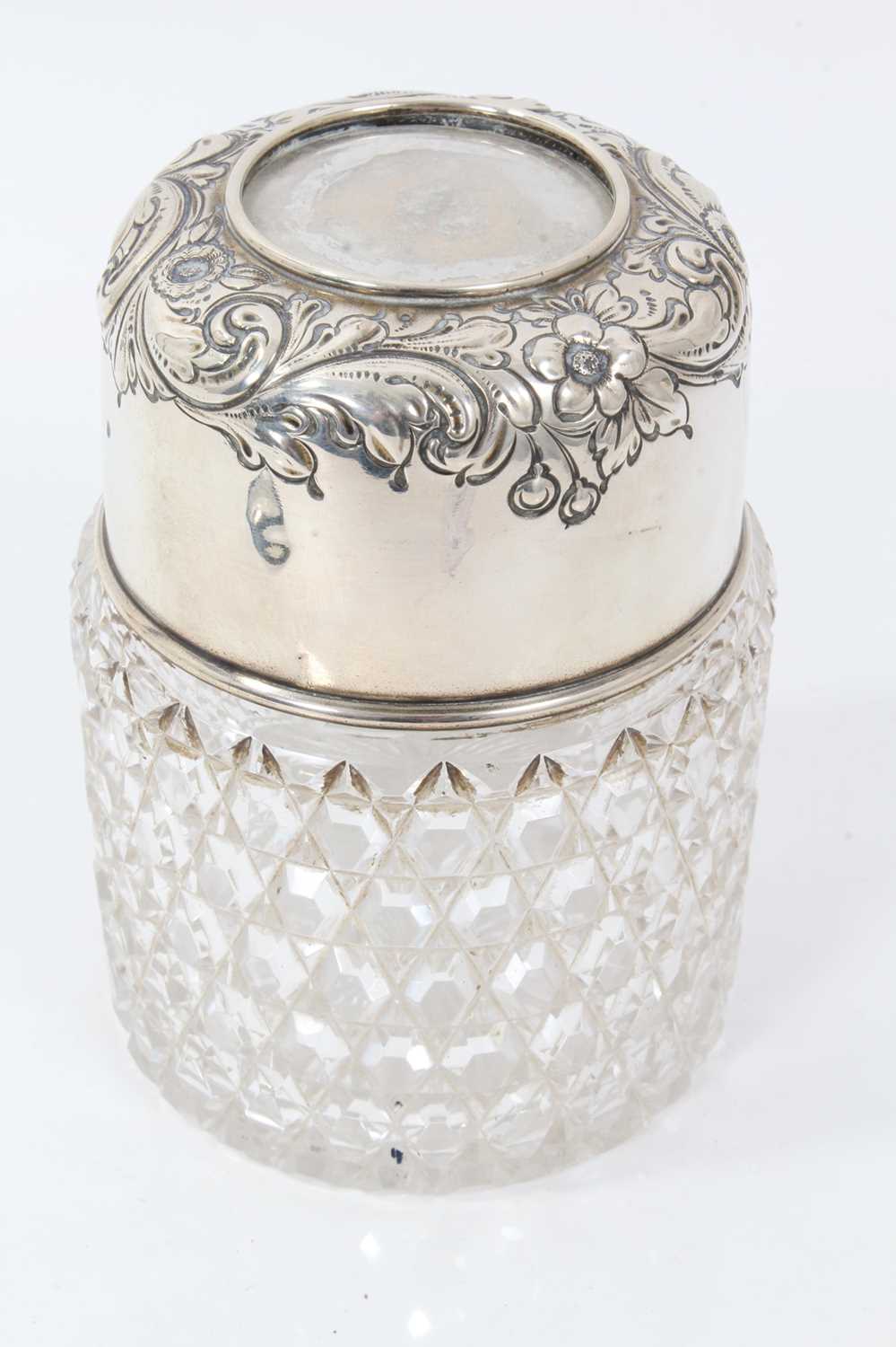 Large early 20th century American silver and cut glass scent bottle, removable top with embossed scr