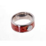 Diamond and enamel ring, the round brilliant cut estimated to weigh approximately 0.20cts on a coral