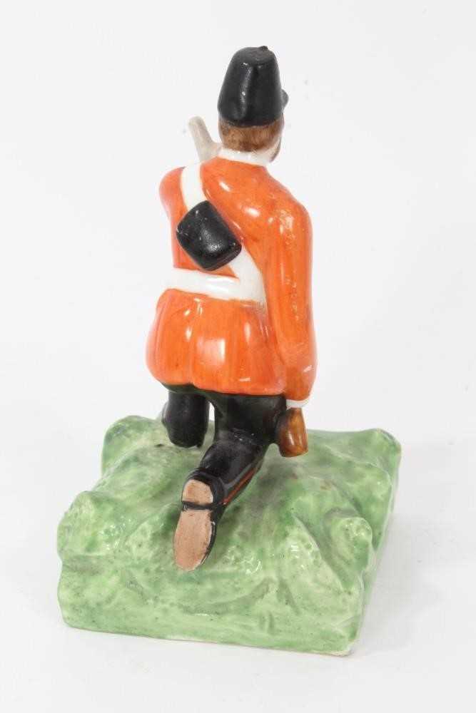 Unusual Derby (King Street Works) figure of a kneeling soldier, circa 1890-1910, polychrome enamelle - Image 3 of 4