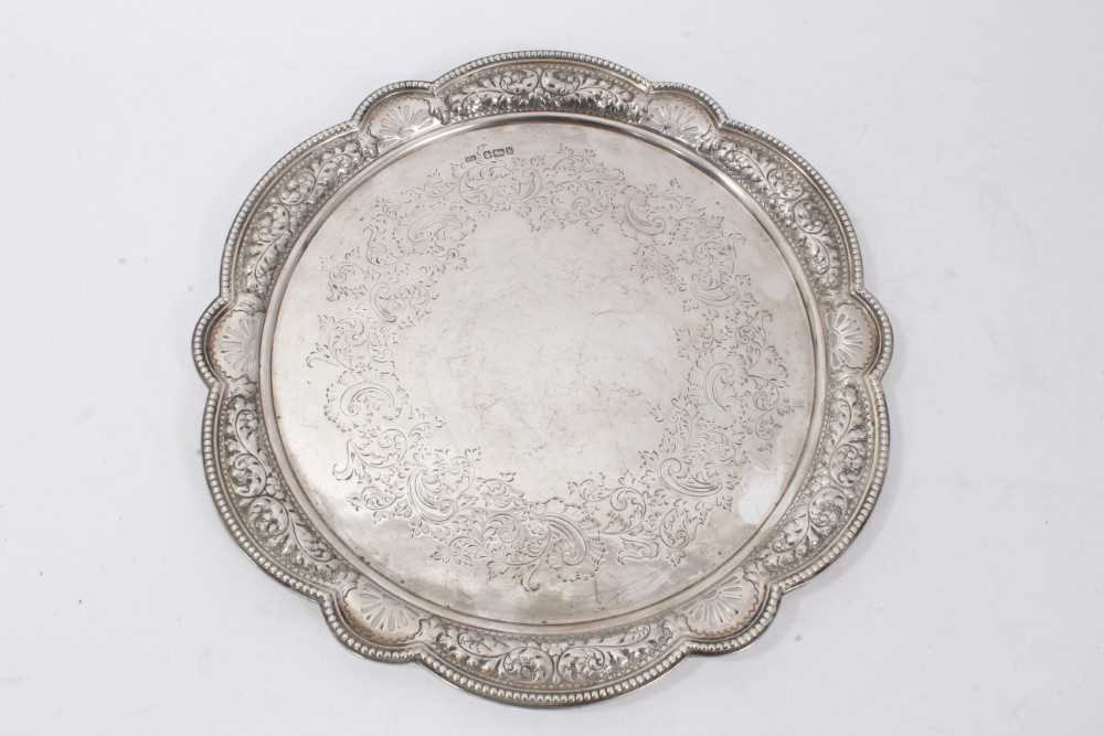 Victorian silver salver of shaped circular form, with pierced and embossed foliate border