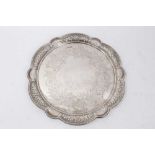 Victorian silver salver of shaped circular form, with pierced and embossed foliate border