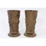 Pair of 19th century cylindrical bronze goblets with floral decoration