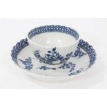 Caughley tea bowl and saucer, circa 1780, of fluted form, printed in blue with the 'Apple' pattern,