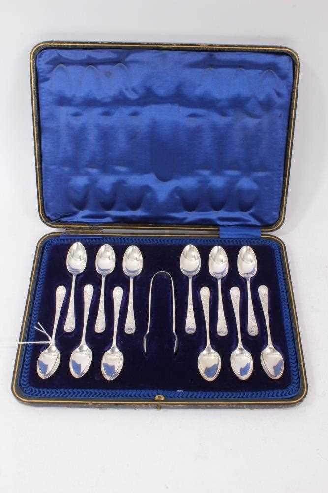 Late Victorian/Edwardian silver matched set of twelve teaspoons and pair of sugar tongs,