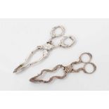 Pair of George III silver scissor action sugar nips, circa. 1760, 12cm overall, together with a pair