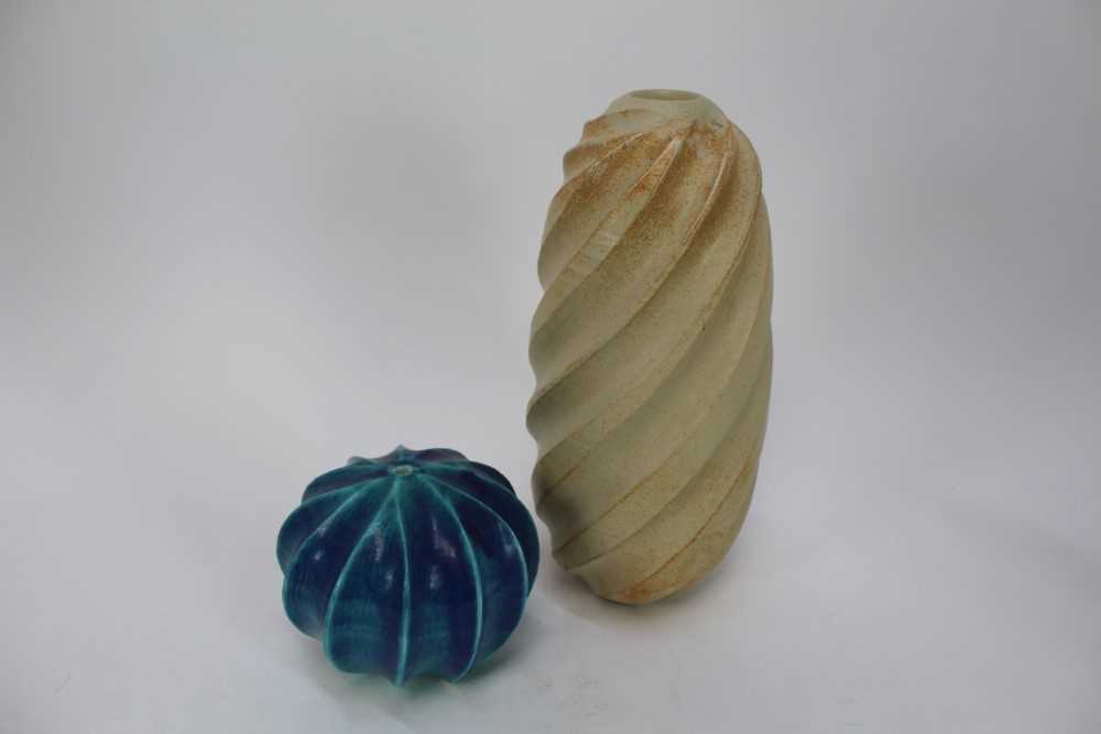 Two studio pottery vases by Usch Spettigue, one of ovoid form with a spiral pattern, the other blue-