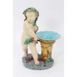 Victorian Minton majolica glazed figural vase with a bacchanalian putti