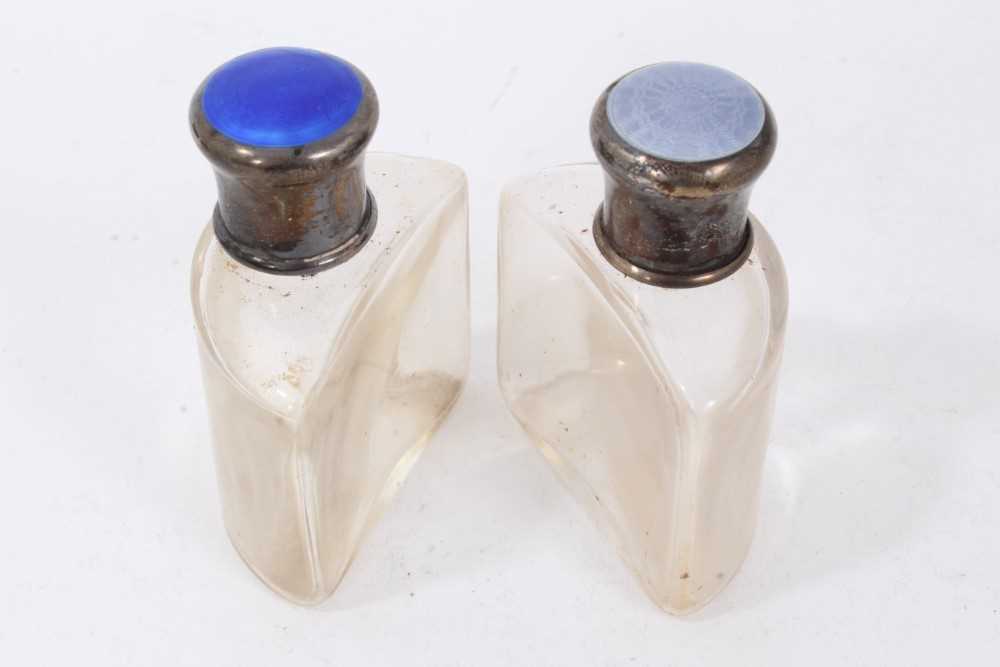 Two early 20th century glass scent bottles with silver and guilloche enamel tops in a leather case - Image 2 of 9