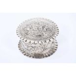 Late 19th century German silver box of circular form with ornate embossed