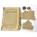 Persian printed version of Koran and two brass crotal bells