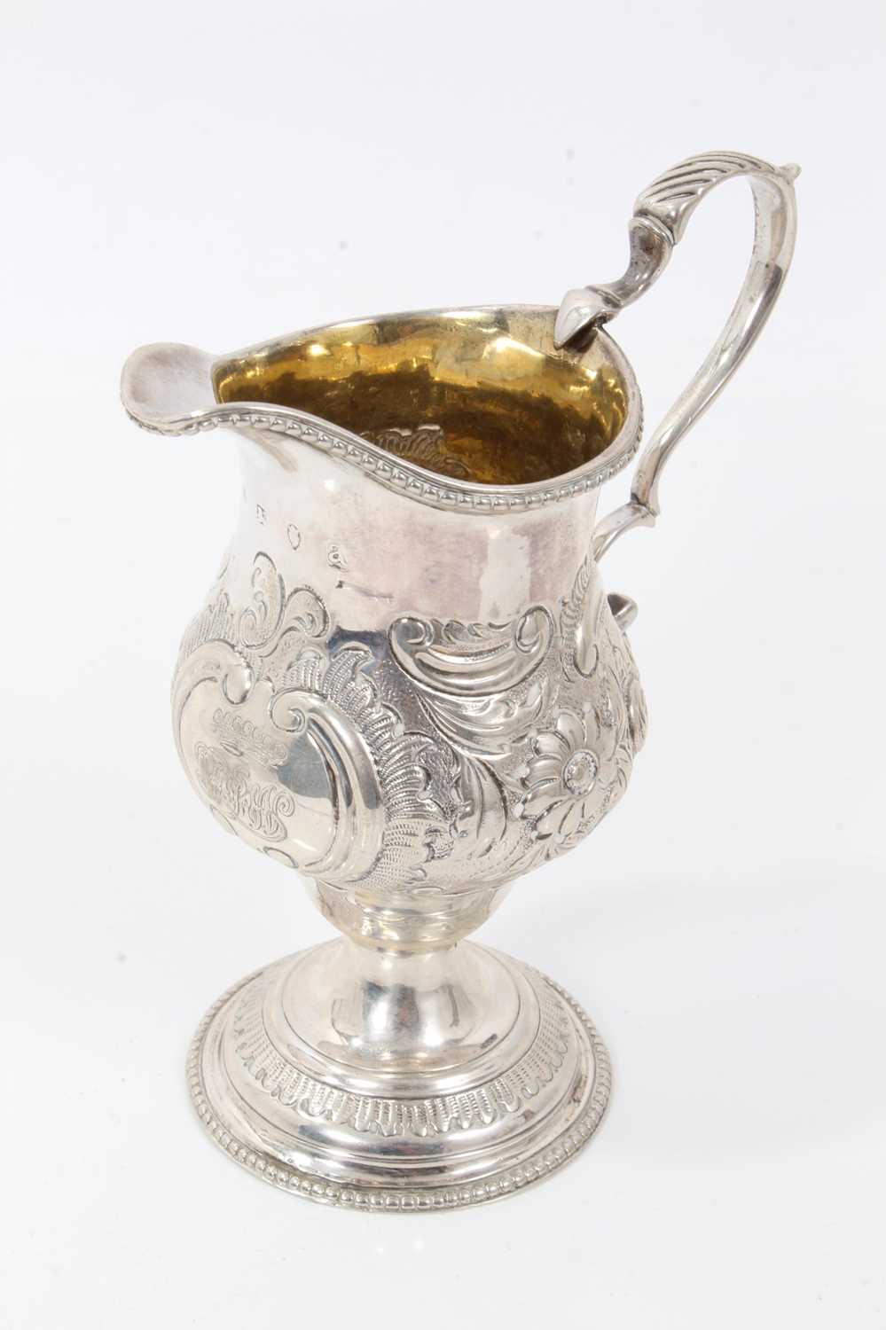 George III silver cream jug with engraved coronet and monogram