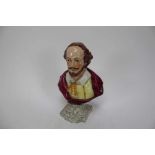 Victorian Staffordshire pearlware-glazed bust of Shakespeare, on a marbled base, 22.5cm high