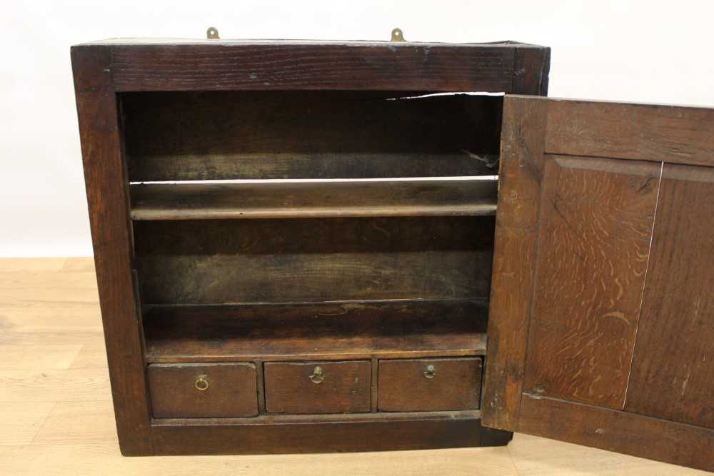 18th century oak hanging cupboard with three spice drawers and shelf enclosed by a panelled door wit - Image 3 of 7
